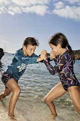 Family wearing matching prints swimwear